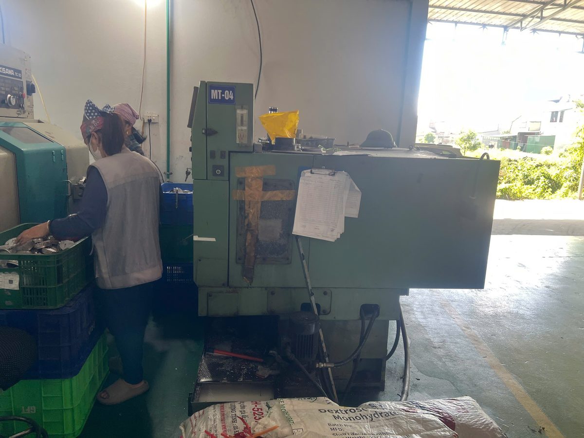 Automatic tapping machine at Minh Quang